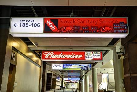 Novak Sanitary lighted sign inside Denny Sanford Premier Center.