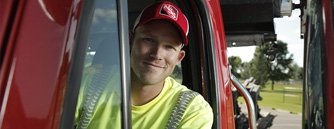 Photo of Novak Sanitary driver smiling.