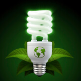 Image of green-glowing CFL bulb.