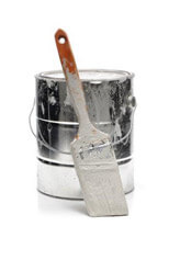 Image of paintbrush and paint can.