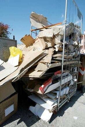 Image of disheveled pile of paper and documents.